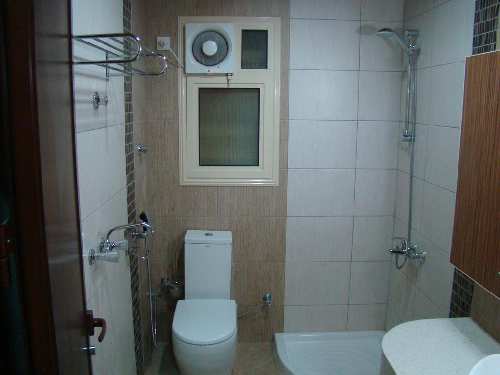 Manazilna Apartments Riad Habitación foto