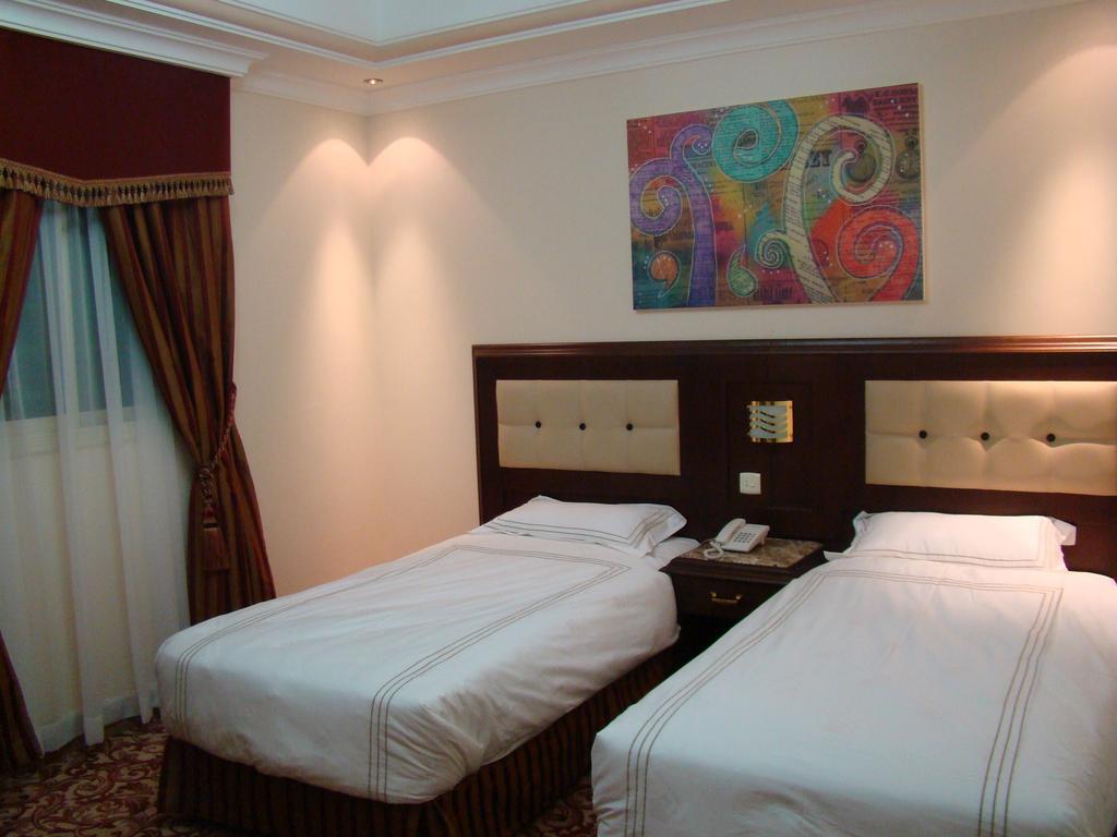 Manazilna Apartments Riad Habitación foto