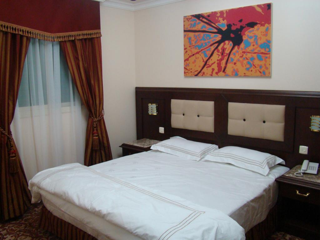 Manazilna Apartments Riad Habitación foto