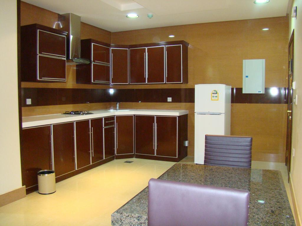 Manazilna Apartments Riad Habitación foto