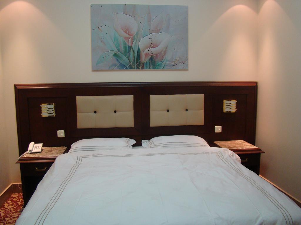 Manazilna Apartments Riad Habitación foto