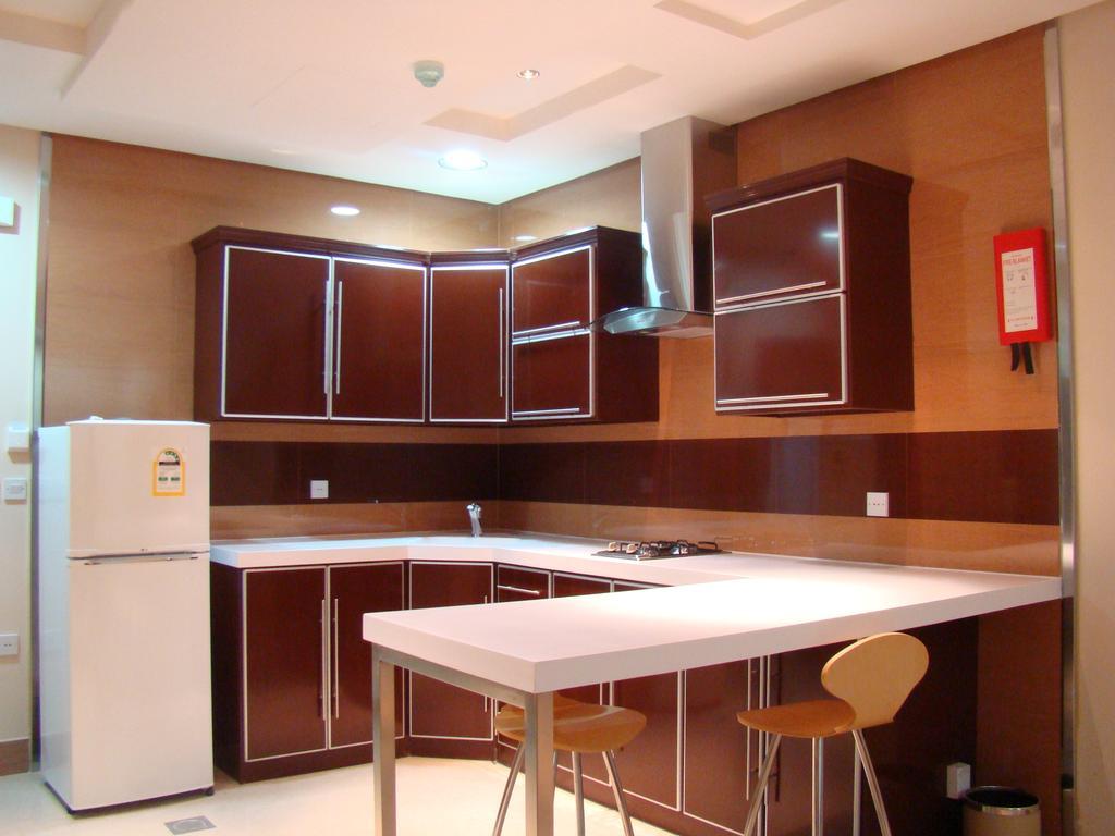 Manazilna Apartments Riad Habitación foto